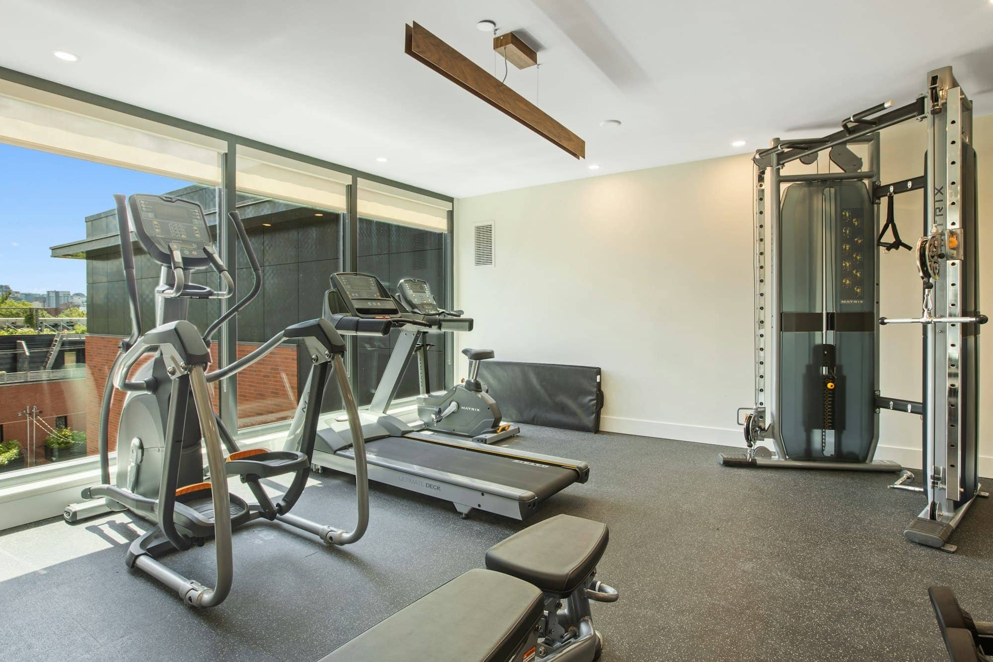 Home gym — complete room, concrete floor and oak joinery